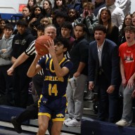 Jericho’s Suvir Mohan launches a three-pointer in the first half of a game against New Hyde Park on Thursday, Feb. 5.