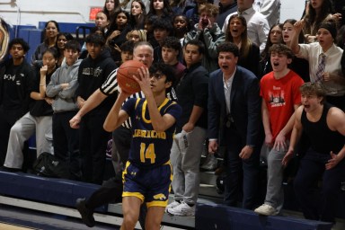 Jericho’s Suvir Mohan launches a three-pointer in the first half of a game against New Hyde Park on Thursday, Feb. 5.
