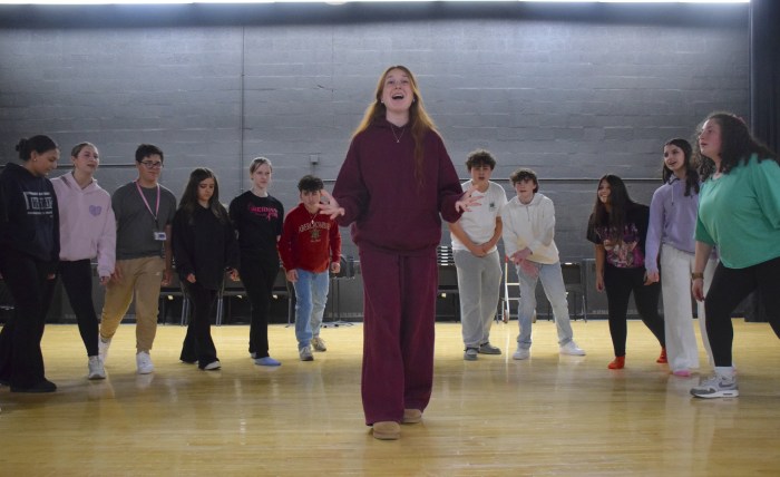 Allison Hassell, who plays the lead role of Cady, rehearses a musical number along withthe ensemble.