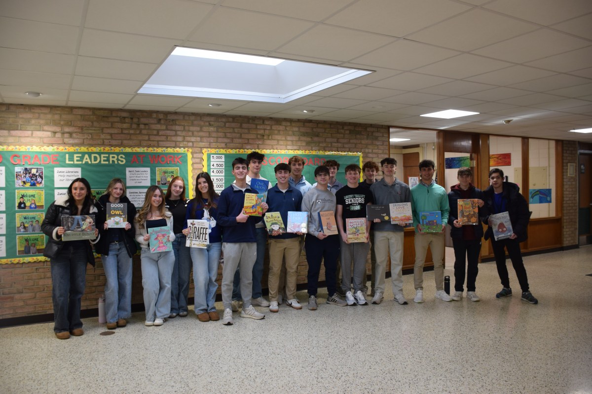 Locust Valley High School student readers returned to their old home at Ann MacArthur Primary School.