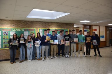 Locust Valley High School student readers returned to their old home at Ann MacArthur Primary School.