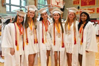Sacred Heart Academy students celebrate graduation.