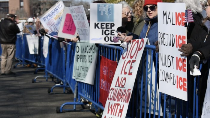 Demonstrators held signs and chanted.