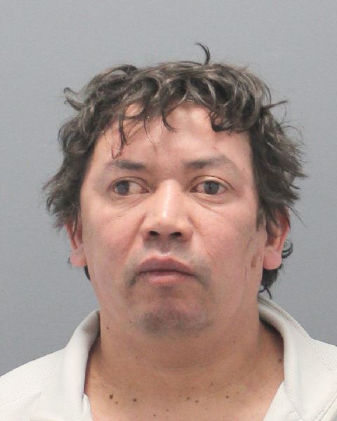 Defendant Edwin Zetina, 44, was arrested for attacking two police officers in a Jericho traffic stop, Nassau County police report.