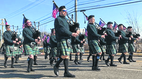 Bagpipe players march in the 2019 Bay Shore-Brightwaters St. Patrick's Day Parade.