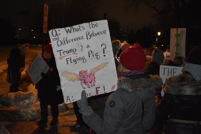 Protestors chanted "ICE out!" and other phrases against local officials' support of federal immigration enforcement tactics.