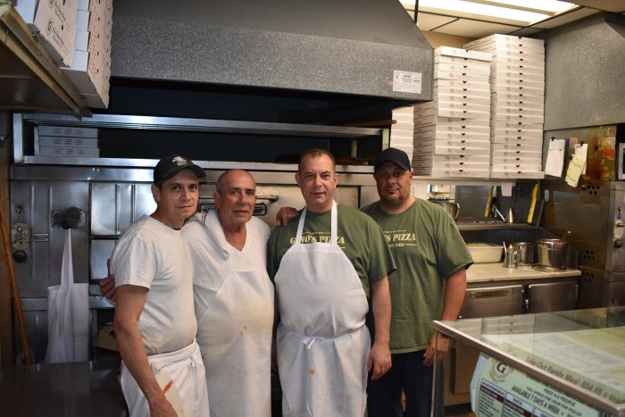 Frank Speciale (Center L.) has run the business for 47 years with his family, including his son, Gerry (R.).