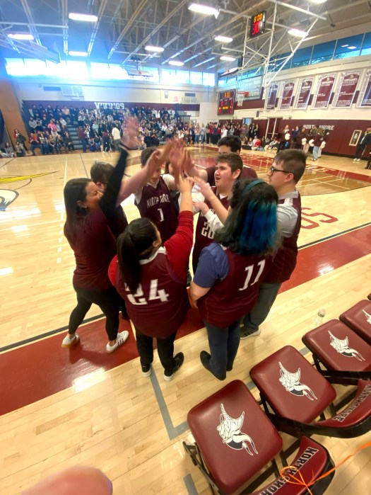 The North Shore Vikings team celebrated their teamwork. 