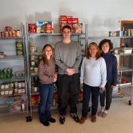 Volunteers Donna Meth, Joseph Vernice, Director of Parish Social Ministry Roxana Sienko and Carrie Cheung in the St. Peter Alcantara Food Pantry.
