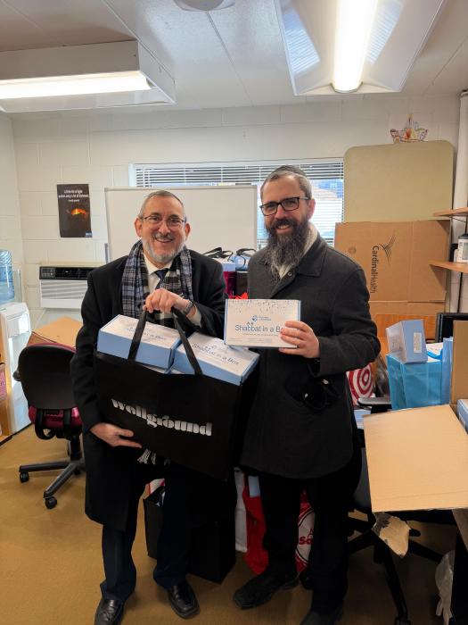 Rabbi Hillel Fox and Rabbi Yossi Mendelson (L. to R.) with Shabbat in a Box