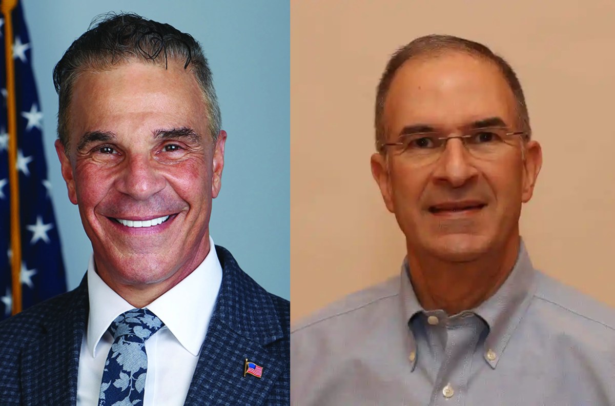 Vincent Muscarella (R.) will serve as the town's commissioner of planning and economic development, and his brother, Michael Muscarella (L.) sits on the town council.