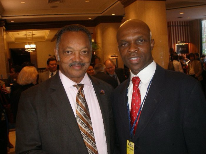 Author George C. Onuorah (R.) with Rev. Jesse Jackson (L.).