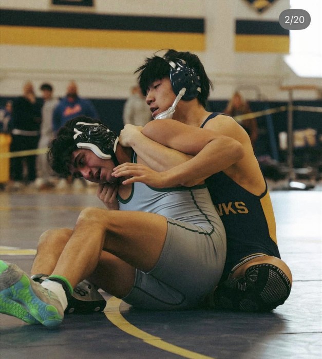 High school wrestlers competing at the 2026 Nassau County qualifier tournament hosted by Jericho High School.