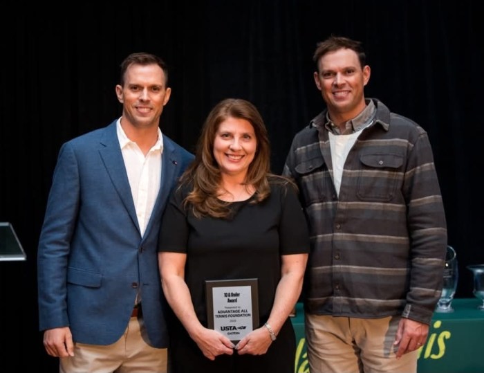 Roslyn Tennis Coach KerriAnn Jannotte-Hinkley (C.) and the Bryan Brothers (L.) and (R.) at the United States Tennis Association awards night. 