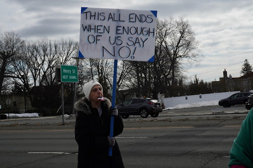 A 'DE-ICE Nassau County' rally drew a pro-Trump caravan in counter-protest.