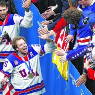 Long Island native Charlie McAvoy celebrates the U.S. Men's Hockey gold medal win at the 2026 winter Olympics.