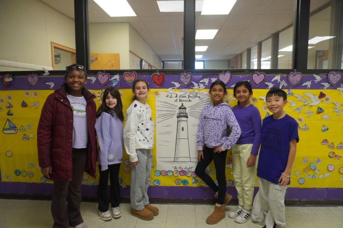 Center Street Elementary School students worked together to create a “P.S. I Love You Day” mural featuring messages of love and kindness.
