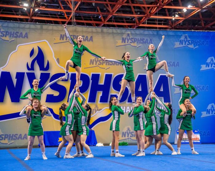 The Dalers execute their high-difficulty pyramid during the state finals.