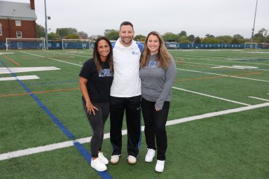 Port Washington educator and varsity softball coach Eric Sutz (C.) was named New York State Coach of the Year, a recognition he calls a team effort with the help of his assistant coaches Alyssa Czarnecki (L.) and Alexandra Caprariello (R.).