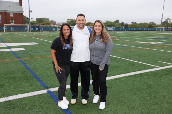 Port Washington educator and varsity softball coach Eric Sutz (C.) was named New York State Coach of the Year, a recognition he calls a team effort with the help of his assistant coaches Alyssa Czarnecki (L.) and Alexandra Caprariello (R.).