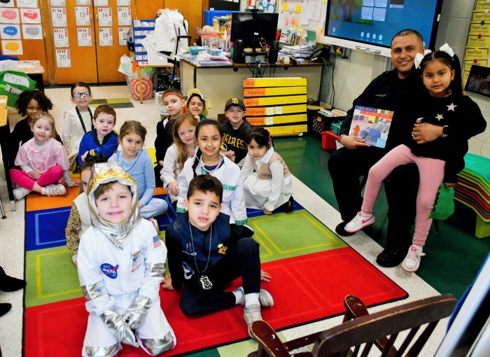 Guest readers read to the Cherry Lane classes.