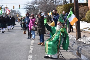 Andy Kuzma dressed as St. Patrick to bless parade goers and participants.
