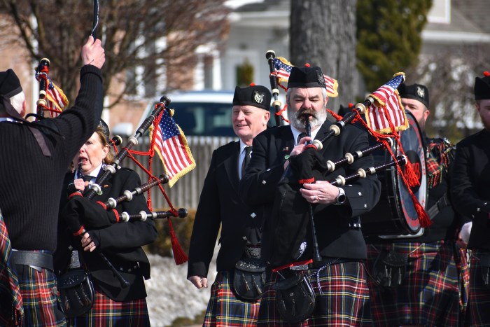 Marching bands from across the island shared bagpipes and drums in the Bethpage parade.