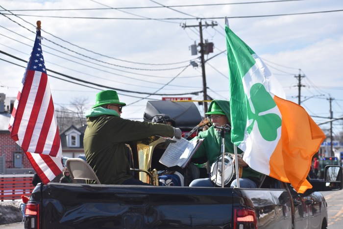 An Irish folk band performed from the bed of a pickup truck