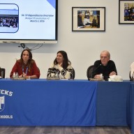 The Herricks school board at a previous meeting.