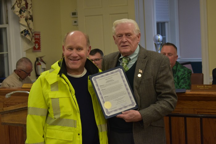 Resident Richard Dierlam, (L.) recieved honors from Mayor Paul Ehrbar (R.) for his dedicated volunteer work.