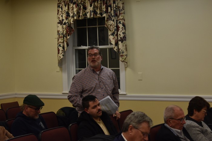 Resident Umberto Mignardi was among the group of neighbors to the lot who raised concerns about the applications code compliance.