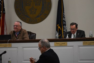 Village officials (L. to R.) Mayor Kevin Fitzgerald, Clerk Joseph O'Grady and Trustee Frank Chiara at the recent meeting, where a junior firefighters program was established.