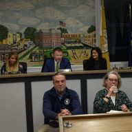 New Hyde Park's village board and department superintendents at the recent trustee meeting.