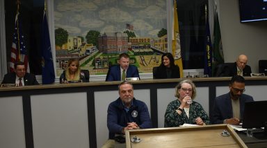 New Hyde Park's village board and department superintendents at the recent trustee meeting.