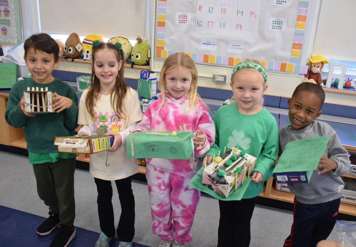 Fairfield Elementary School kindergartners Dominic Schiff, Lena Triculis, Emma Rheel, Taylor Holzapfel and Noah Verlus (L. to R.) made leprechaun traps for a St. Patrick’s Day-themed STEAM activity.