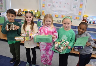 Fairfield Elementary School kindergartners Dominic Schiff, Lena Triculis, Emma Rheel, Taylor Holzapfel and Noah Verlus (L. to R.) made leprechaun traps for a St. Patrick’s Day-themed STEAM activity.