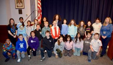 Floral Park-Bellerose School and John Lewis Childs School fifth graders in the S.P.A.R.K. program met with Assembly Member Michaelle C. Solages (C).
