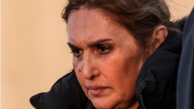 Dr. Roya Jafari-Hassad walks from the federal courthouse in Central Islip after her arraignment, Wednesday, Dec. 14, 2022.