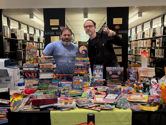 The “Retro Blast!” team was selling vintage physical media at RosCon.