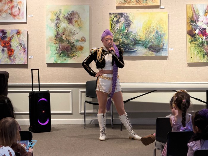 The event finale featured a K-Pop Demon Hunters performance by a singer embodying the lead character, Rumi Kang, from the Oscar-winning movie.