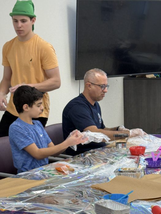 Families made hamentashens as part of the celebration.