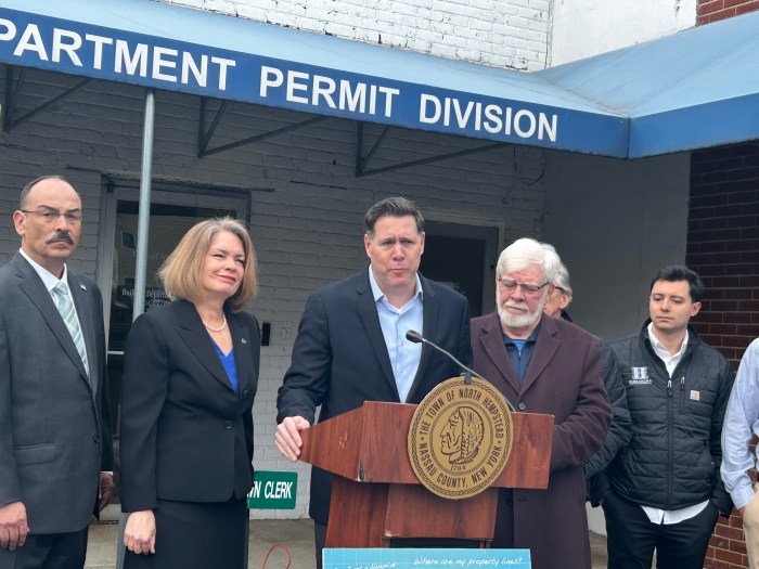 Long Island Builder's Institute CEO Mike Florio (C.) speaking about OpenGov.