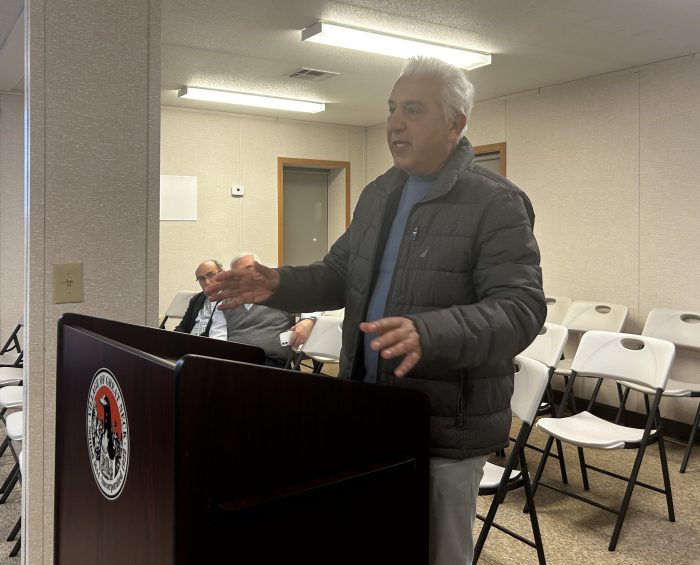 Village of Great Neck resident voices opposition to snow-related violation fees.