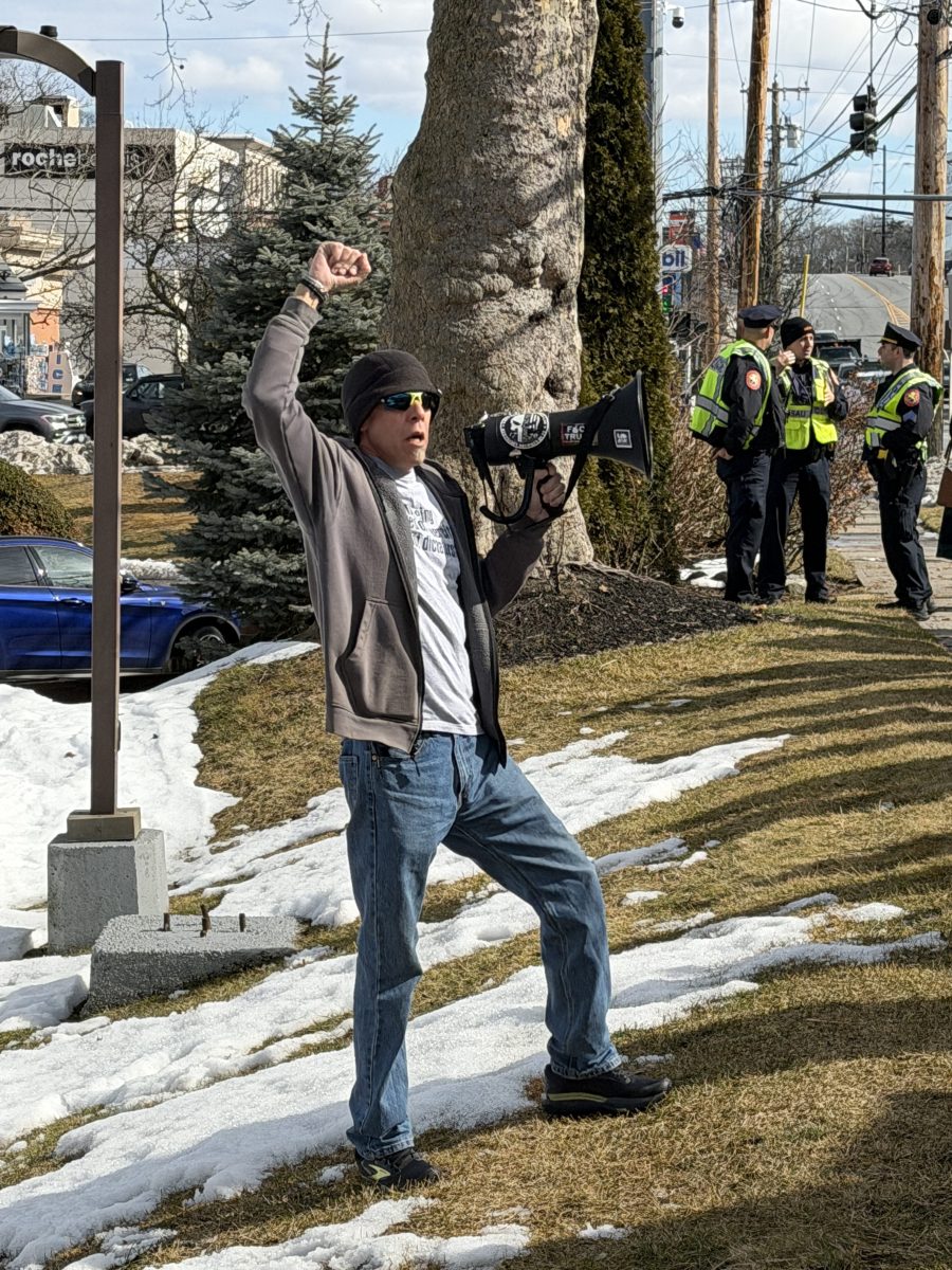 Port Washington Rapid Response Network member David Chapman shared he was arrested after alerting residents U.S. Immigration and Custom Enforcement officers were in the neighborhood.
