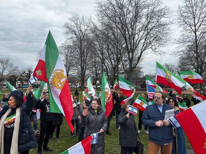 Demonstrators in Great Neck gather to cheer on US and Israeli war efforts in Iran.