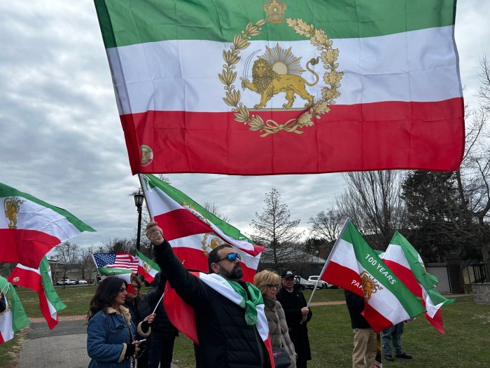 Demonstrators in Great Neck gather to cheer on US and Israeli war efforts in Iran.