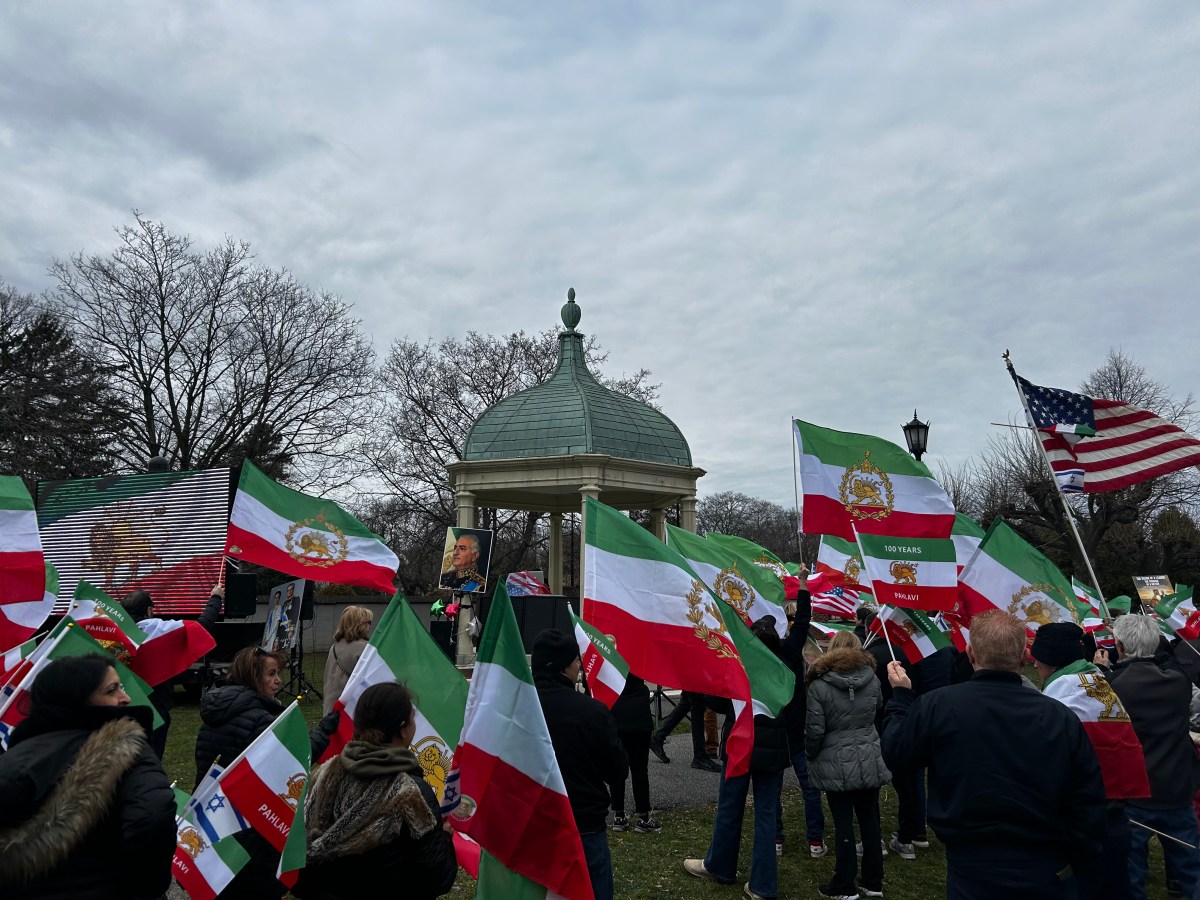 Demonstrators in Great Neck gather to cheer on US and Israeli war efforts in Iran.