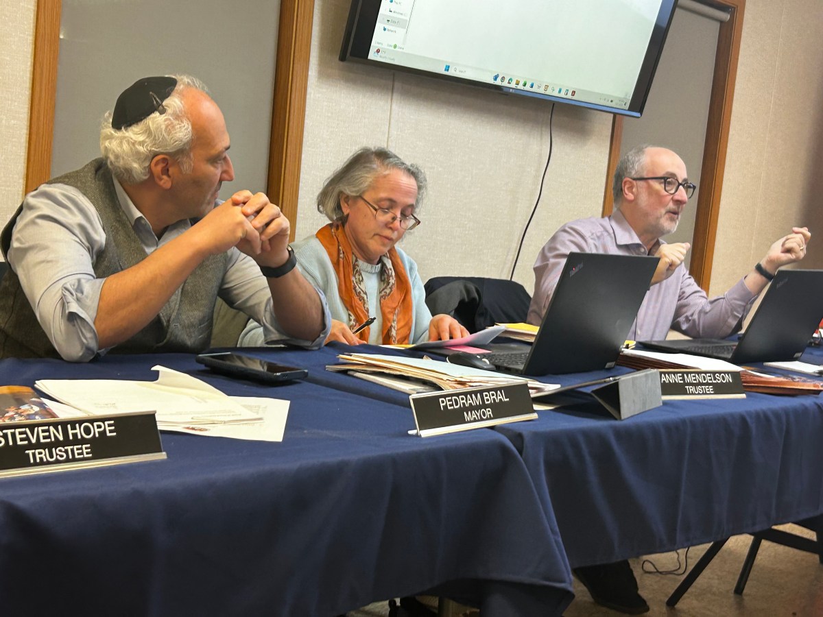 Mayor Pedram Bral, Trustee Anne Mendelson, and Deputy Mayor Barton Sobel (L. to R.) respond to snow fee criticism.