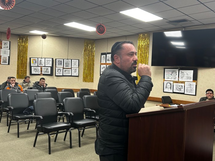 Owner of Shop Delight, Edward Yakubov, speaking to the Great Neck Plaza Board of Trustees.
