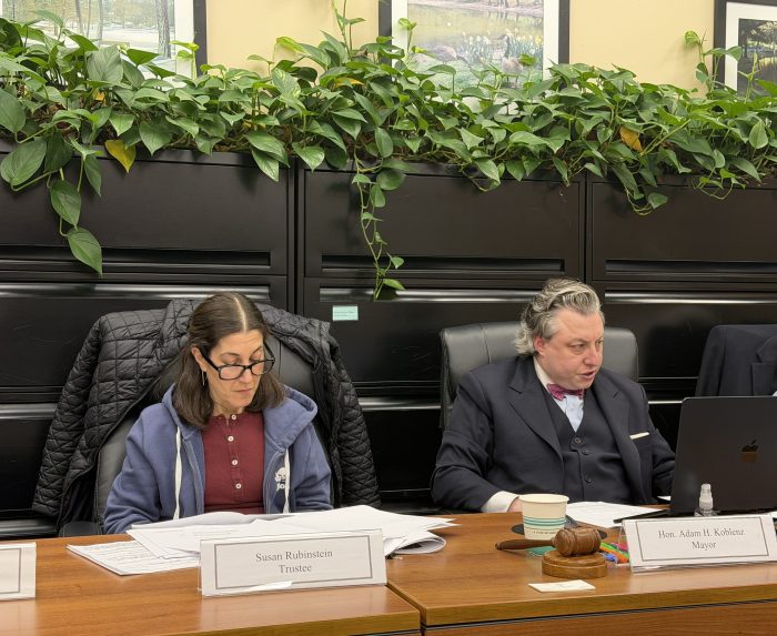 Trustee Susan Rubinstein (L.) and Mayor Adam Koblenz (R.) discussed the proposed village budget and the purchase of a radar gun.